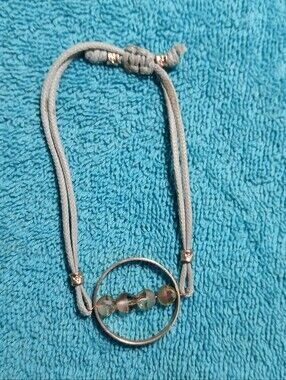 Adjustable Gold Tone Gray Cord Bracelet with Iridescent Beads